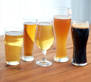 How to drink beer like a pro? Photograph of different styles of beer glass including a pint, weizen and tulip shaped glass